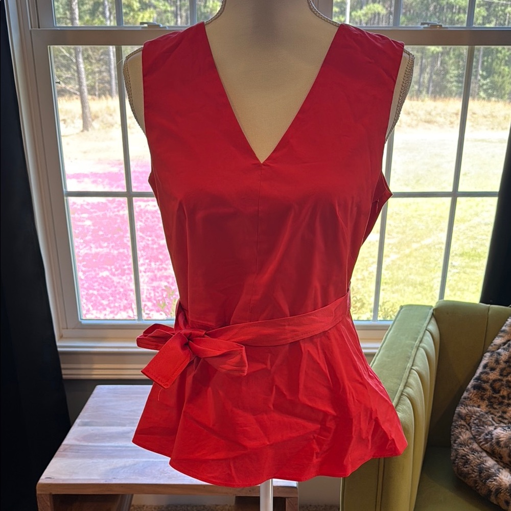 Red Sleeveless Peplum Blouse with Tie Front